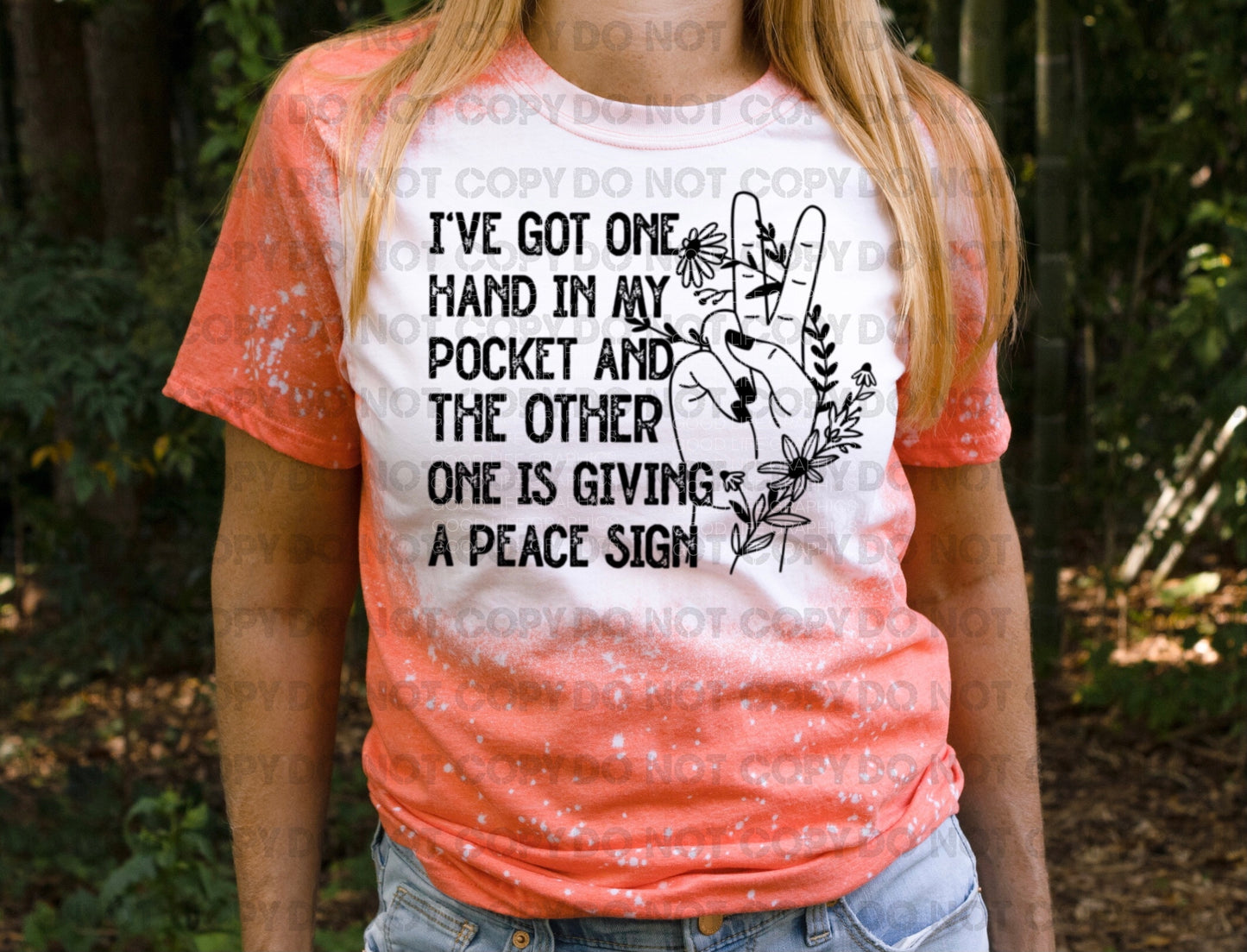 I've got one hand in my pocket and the other one is giving a peace sign